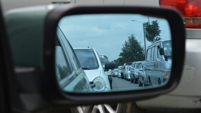 Car seen in a car mirror